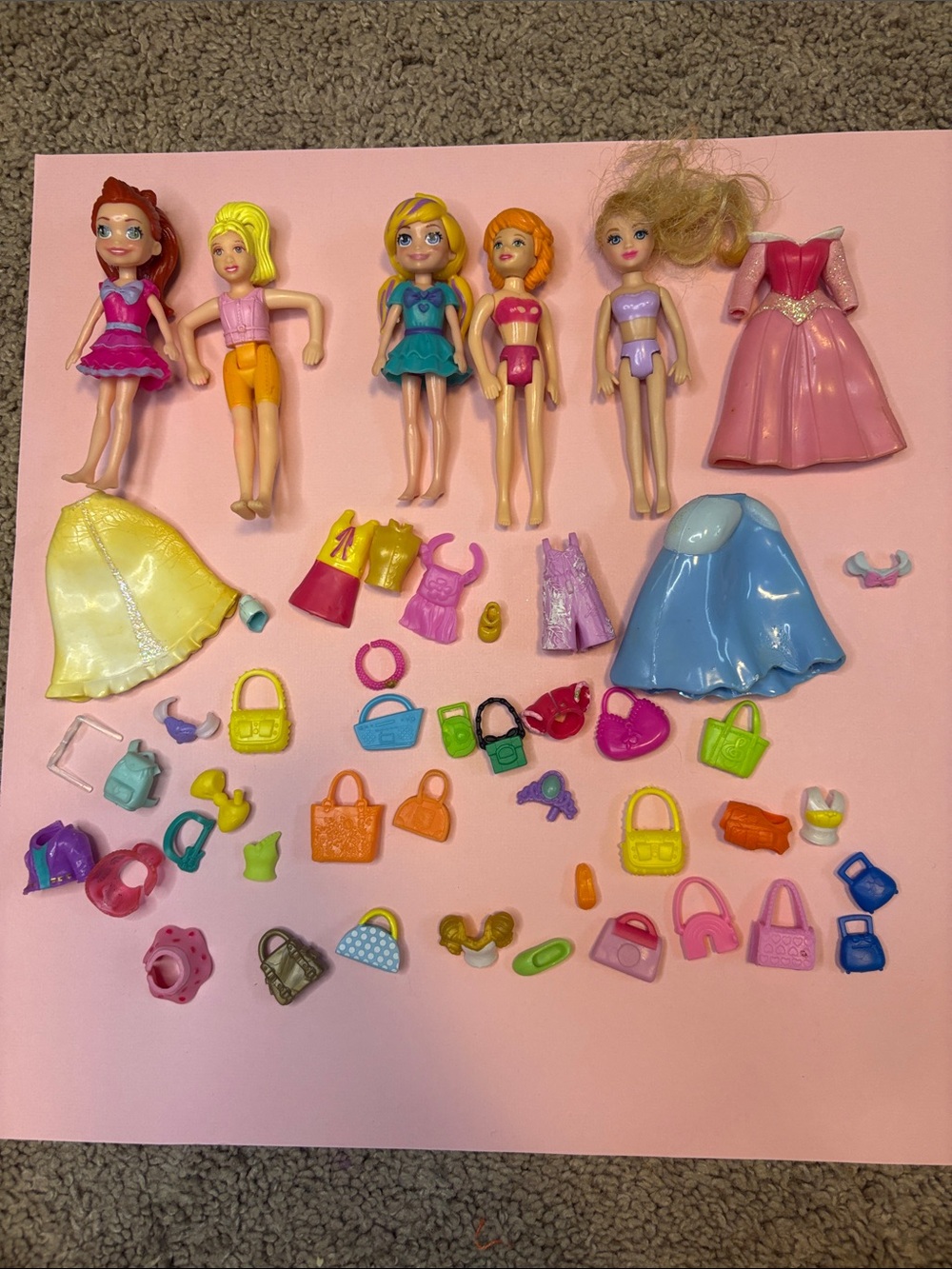 Vintage Polly pocket dolls, clothes, and accessories